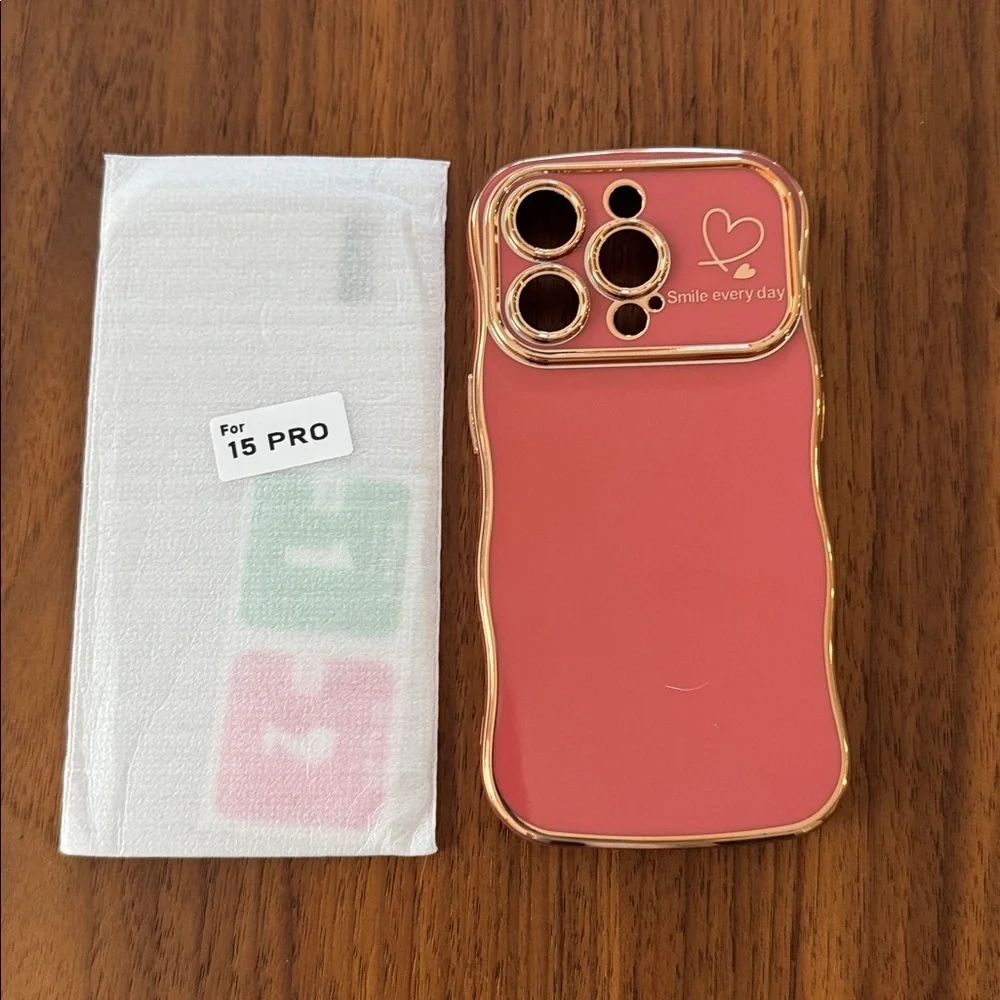 NWOT Faint Red Wave Phone Case for 15 Pro with Gold Trim.